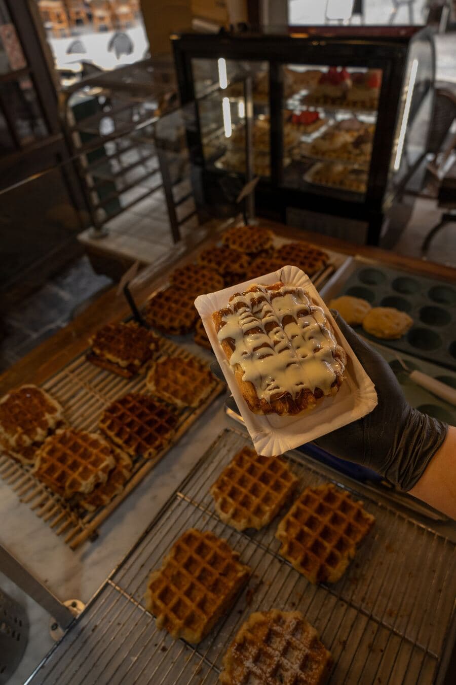 A Liège waffle filled with Belgian chocolate and finished with white chocolate at Le Roi de la Gaufre
